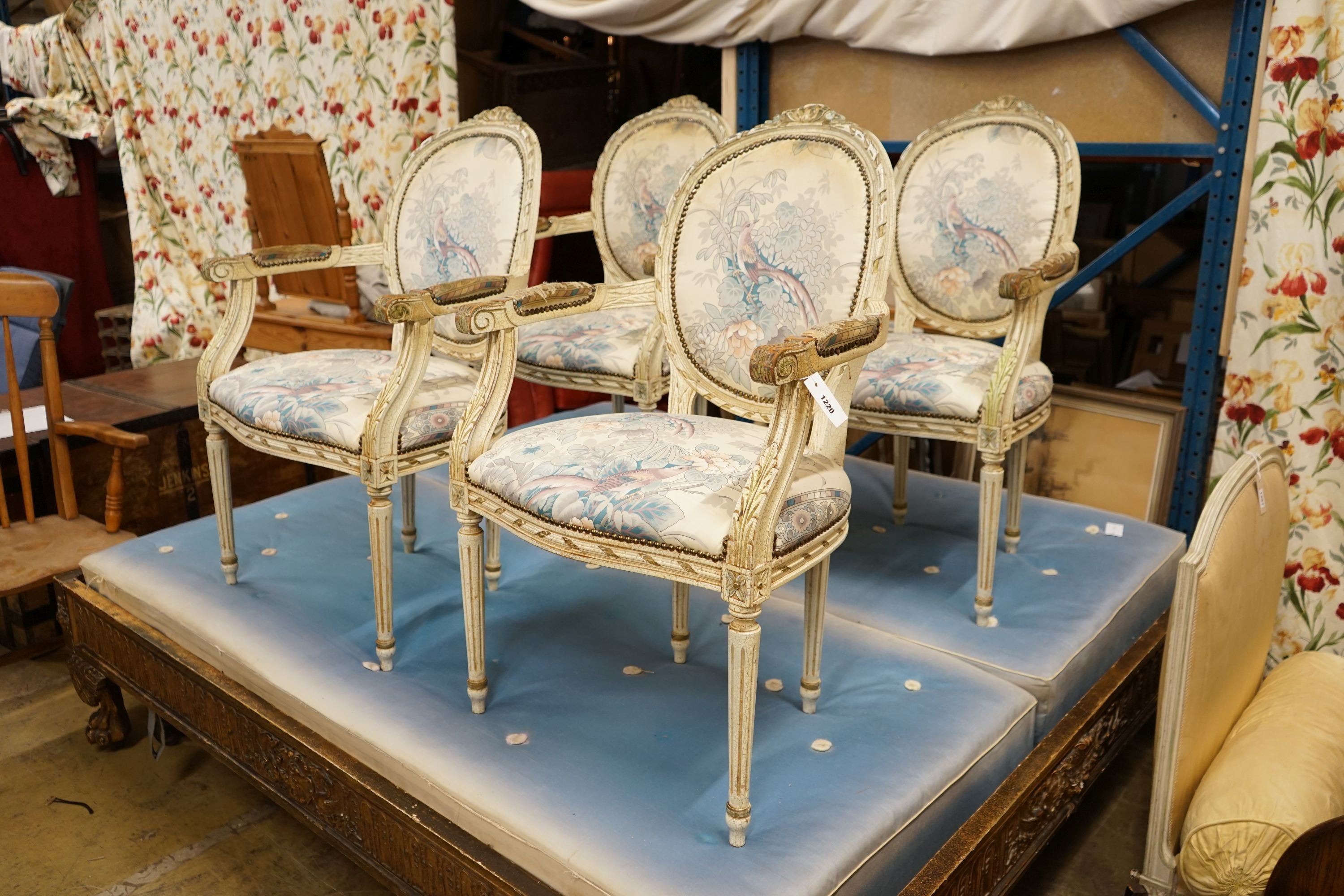 A set of four painted open armchairs, width 59cm, depth 50cm, height 95cm